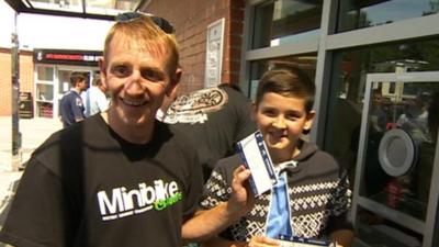 Excited fans with tickets for Real Madrid friendly