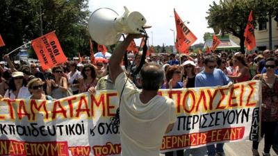 Protesters take part in an anti-austerity rally in Greece on 16 July