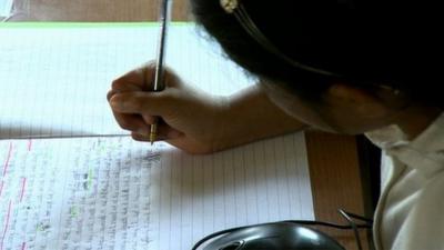 Schoolgirl writing