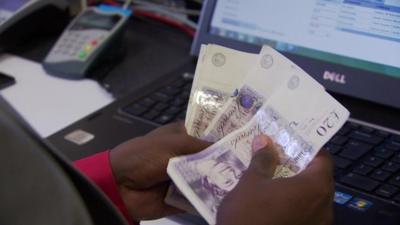 Bank notes being counted