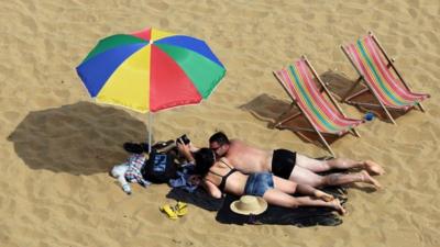 People on the beach in Broadstairs, Kent,