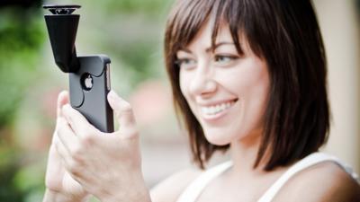 A woman using GoPano camera