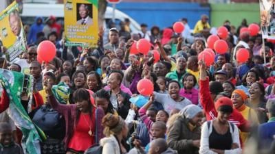 People celebrating outside the hospital in Pretoria