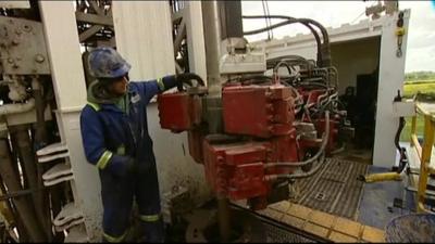 A worker with shale gas machinery