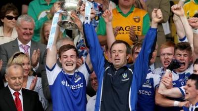 Kevin Loughran lifts the Father Murray Cup