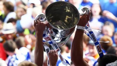 The Anglo Celt Cup is lifted at Clones by Monaghan players