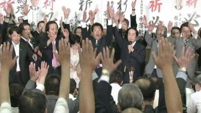 Lib Dem politicians celebrate in Japan