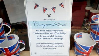 A message in the window of the Highgrove shop in Tetbury, Gloucestershire, celebrating the birth of the royal baby.