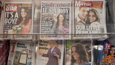 Newspaper front pages with news of royal baby birth