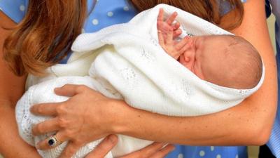 Duchess of Cambridge holds baby son