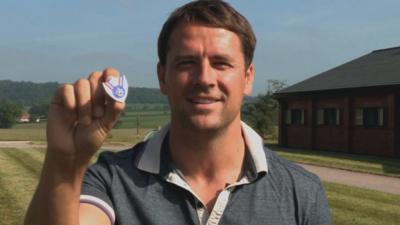 Michael Owen with Blue Peter badge