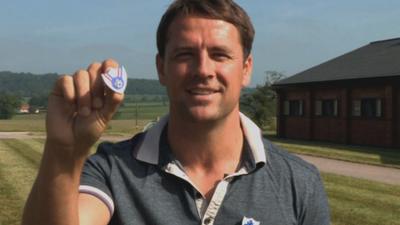 Michael Owen with Blue Peter badge