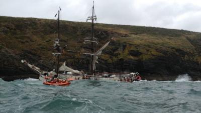 The Astrid tall ship and a lifeboat