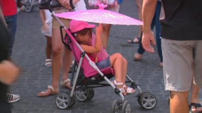 Girl in pushchair