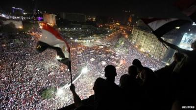 Protesters look down on Cairo's Tahrir Square, 26 July