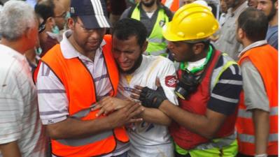 Man comforted on Cairo streets