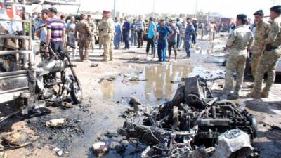 The aftermath of a car bomb in Kut