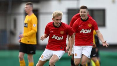 Oliver McBurney celebrates after scoring for Manchester United against County Antrim in the Under-17 competition