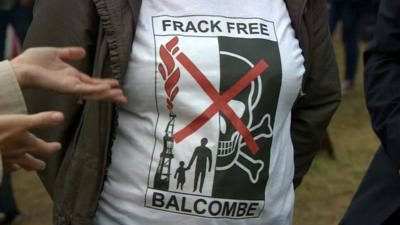 A protestor wearing an anti-fracking t-shirt