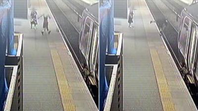 Man tumbles onto a railway track
