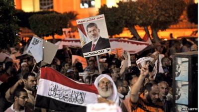 President Mohammed Morsi supporters hold a demonstration against the government in Cairo on July 31, 2013