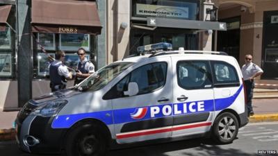 A police parked in front of the Kronometry watch shop following a robbery