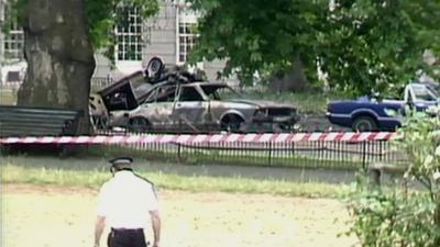 Burnt-out car after Hyde Park Bombing, 1982