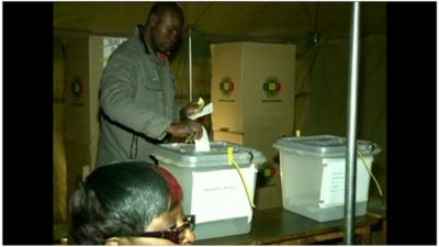 Zimbabwean man at a polling station