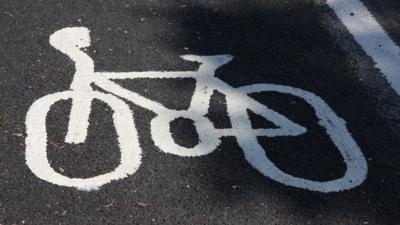 Cycle logo painted on cycle lane