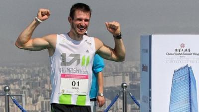 Thomas Dold at top of China World Tower