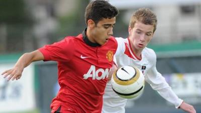 Man Utd v Tyrone action