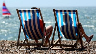 Sunbathers on beach