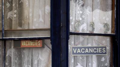 Vacancies signs in a window