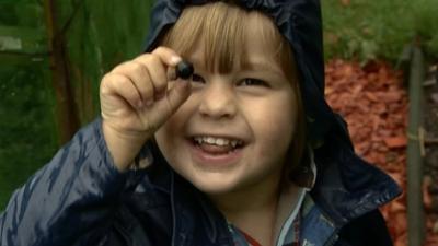 Boy with a berry