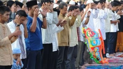 Indonesian Muslims hold Eid al-Fitr prayers in Cianjur, West Java on August 8, 2013