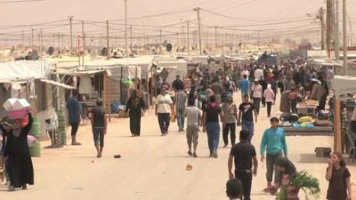 A bustling street dubbed 'Champs Elysees' inside the Zaatari camp.