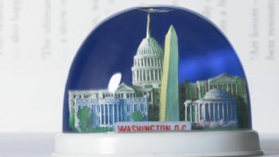 A snow globe containing famous Washington landmarks