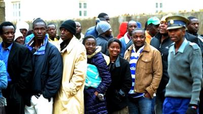 Zimbabweans queuing to vote