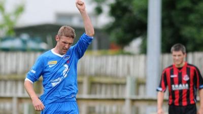 Andy Crawford celebrates scoring the winner against Crusaders