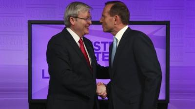 Australian PM Kevin Rudd and opposition leader Tony Abbot shake hands in Canberra (11 Aug 2013)