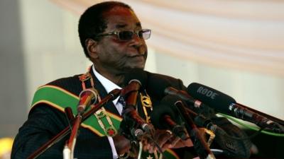 Zimbabwe President Robert Mugabe delivers a speech at the National Heroes Acre in Harare