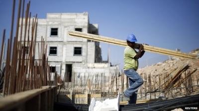 Construction worker on Israeli settlement