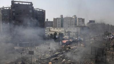 Plumes of smoke rise from the site of a protest in support of deposed Egyptian President Mohammed Morsi during a violent crackdown by Egyptian Security Forces on a pro-Morsi sit-in demonstration at the Rabaa al-Adweya Mosque in the Nasr City, Cairo, Egypt