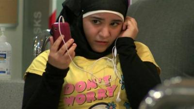 Jordanian girl using mobile phone