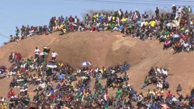 Hundreds of people gathered on the hill at Marikana where 34 miners were killed last year