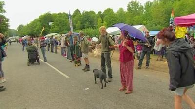 Fracking protesters forming a human chain