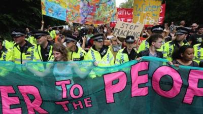 Fracking protesters and police