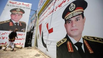 Posters showing Abdul Fattah al-Sisi in Cairo (7 August 2013)