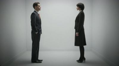 Man and woman in suits