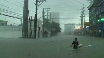 Person in water in Manila